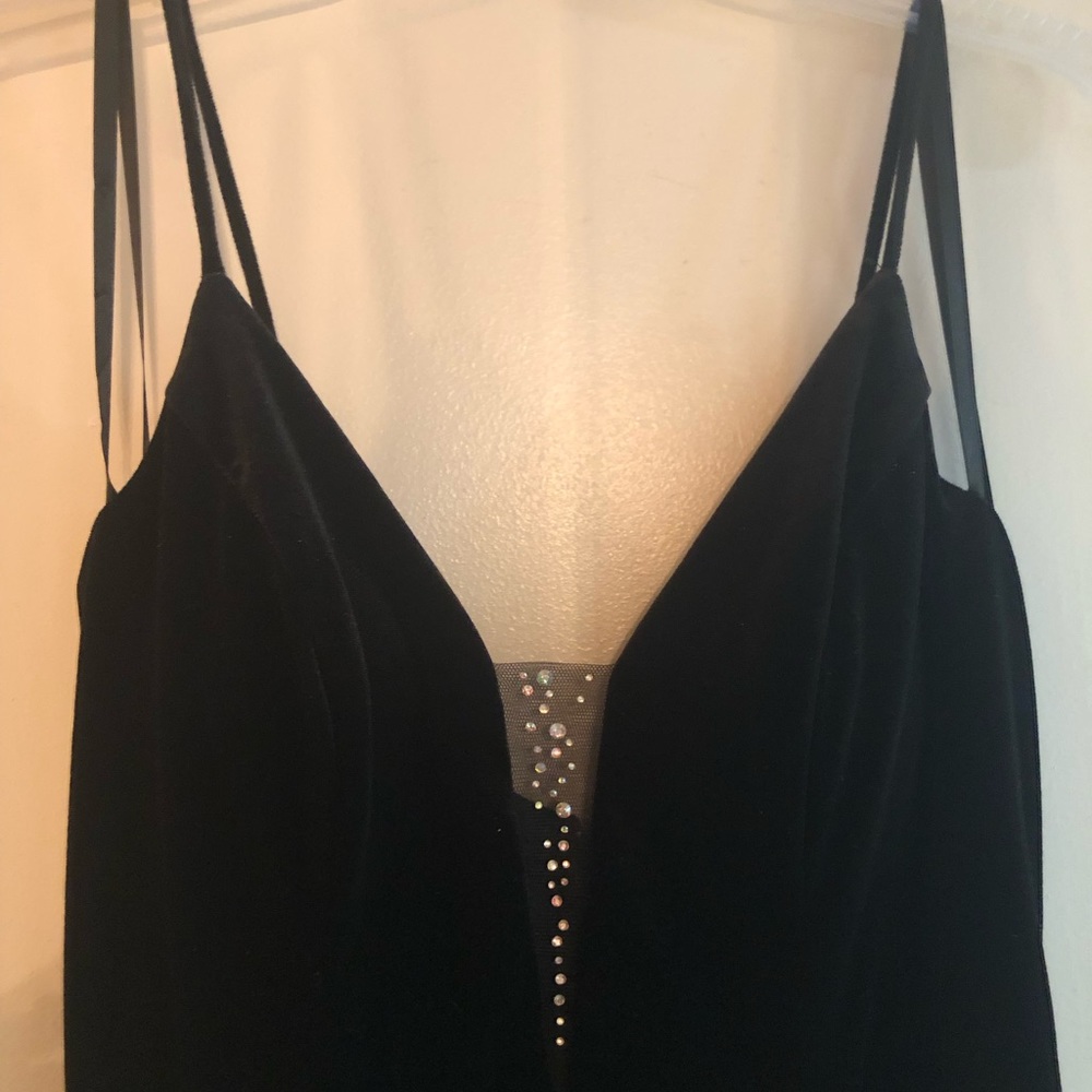 Brand new WITH TAGS- beautiful, black velvet dress. Never worn.